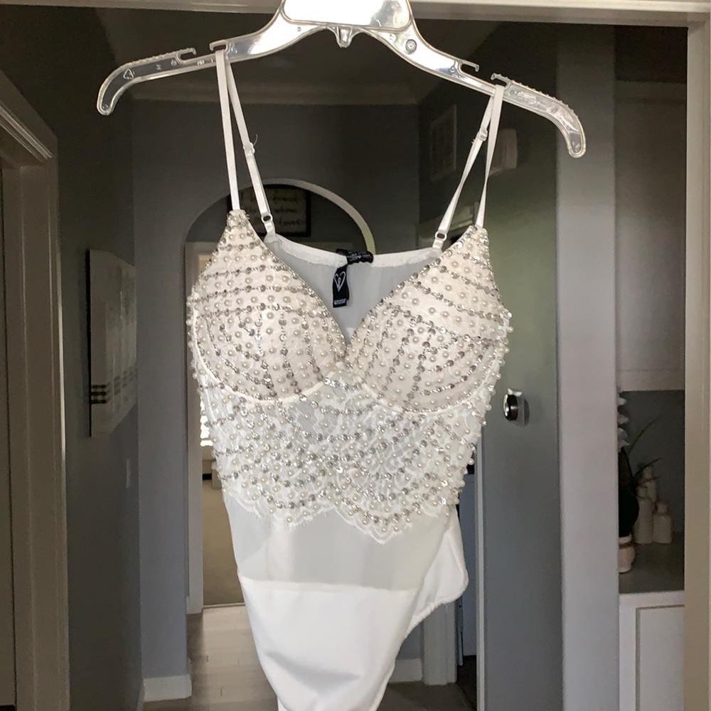 NEVER WORN studded white body suit!